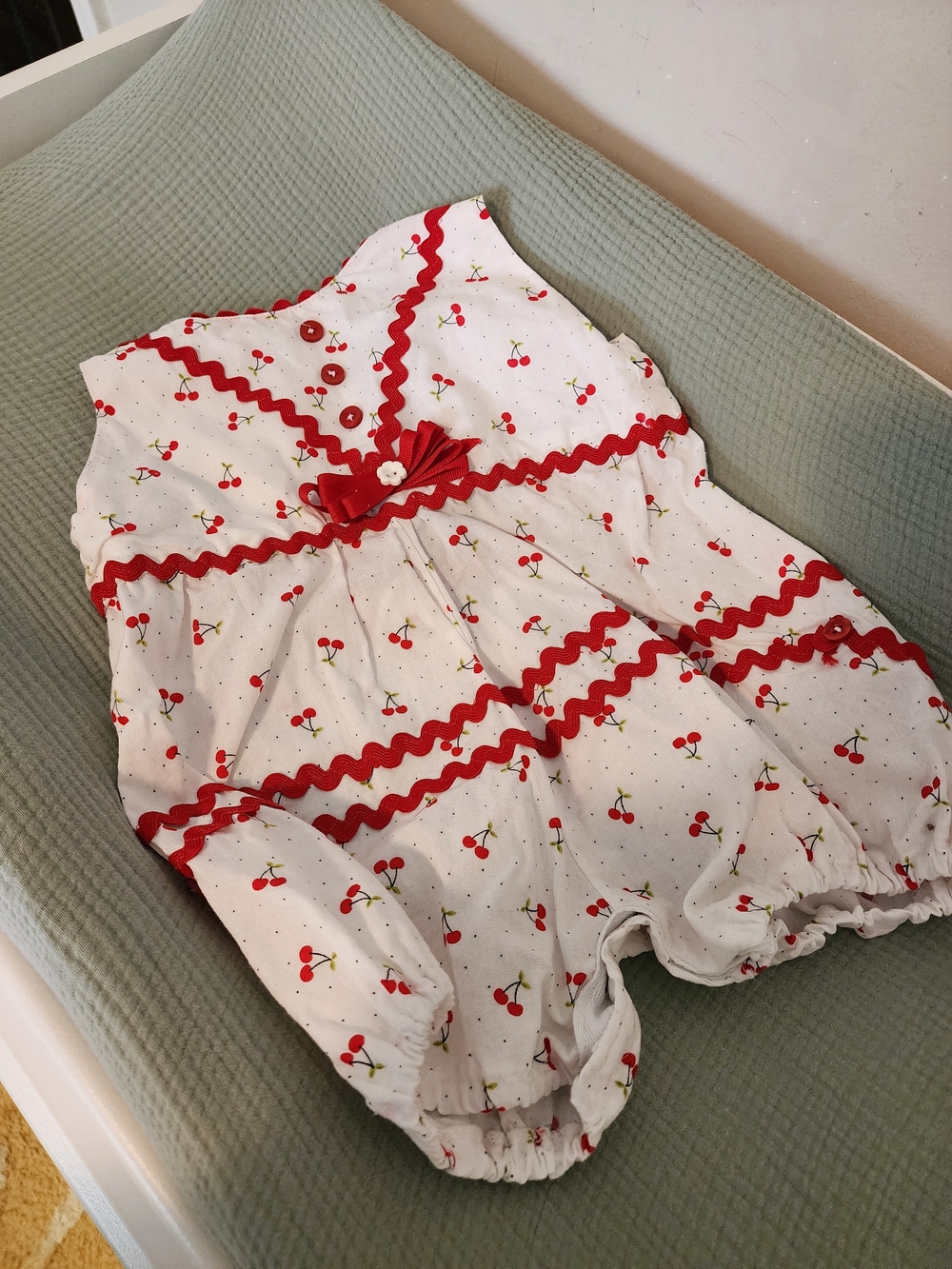Baby Girl Cherry Print Romper with Red Rickrack